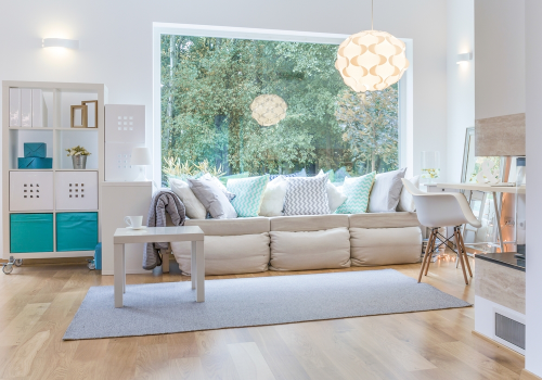 Sofa with nice window view in the background